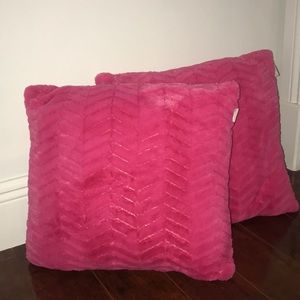 Two pink pillows